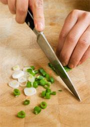 chopping spring onions